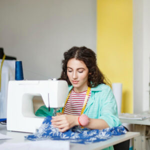 women-stitching-blue-dress