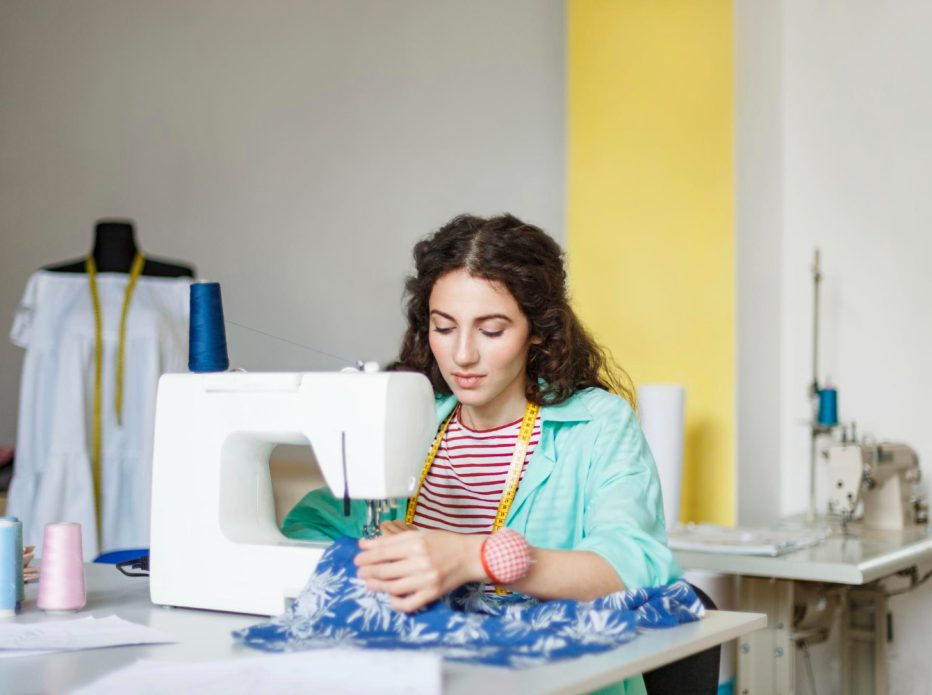 women-stitching-blue-dress